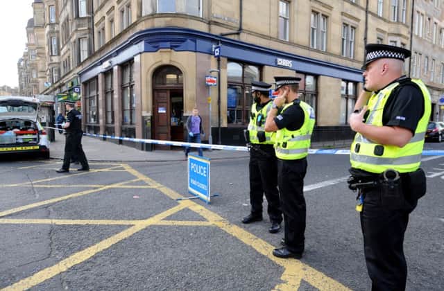 Police respond to reports of a robbery at the RBS branch in Tollcross. Picture: Jane Barlow