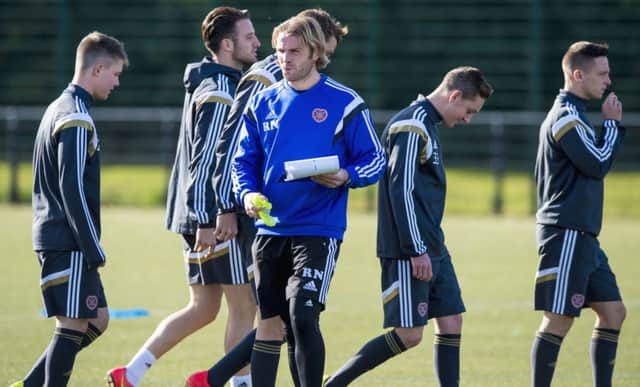 Robbie Neilson has spent the week preparing his players to play on artificial pitches both this weekend and next. Picture: SNS