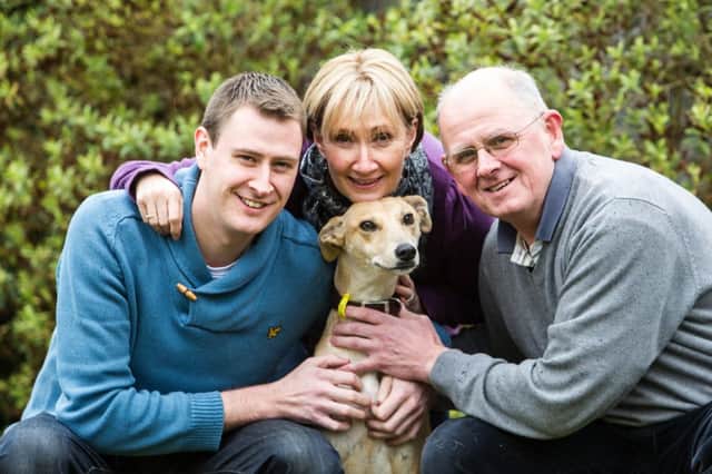 Crossbreed Honey with her new family, the McPhees. Picture: John Devlin