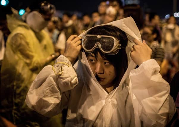 A student dons protective clothing. Picture: Getty
