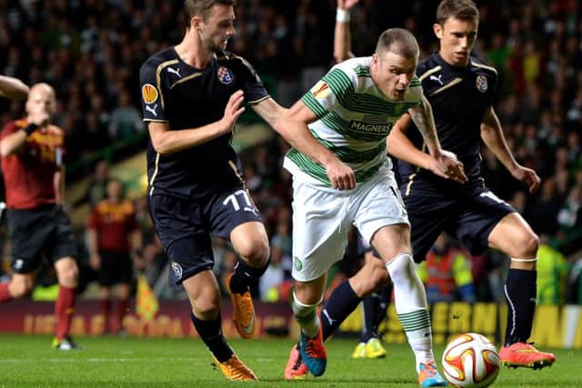 Celtics Anthony Stokes takes on Marcelo Brozovic and Josip Pivaric of Dinamo Zagreb at Parkhead last night. Picture: Getty