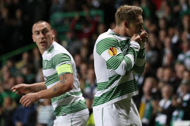 Celtic matchwinner Kris Commons celebrates opening the scoring in the sixth minute. Picture: Reuters