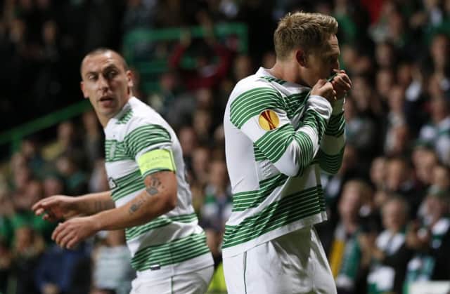 Celtic matchwinner Kris Commons celebrates opening the scoring in the sixth minute. Picture: Reuters