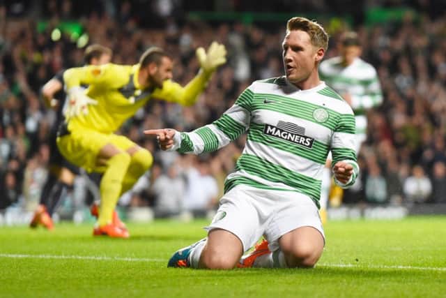 Celtic's Kris Commons celebrates after opening the scoring. Picture: SNS