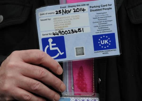 A Blue Badge. Delays in paying the PIP are leaving many without enough money to afford essential living costs. Picture: Neil Hanna