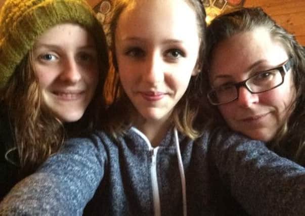 Alice Gross (centre) with her sister Nina, left, and mother Rosalind Hodgkiss. Picture: PA