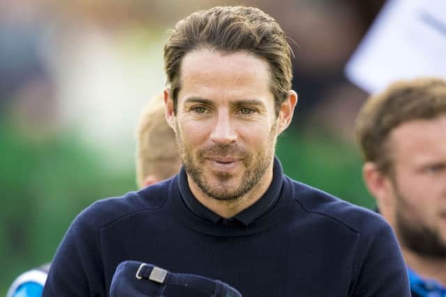 All smiles for former Liverpool footballer Jamie Redknapp as he takes to the St Andrews course. Picture: SNS