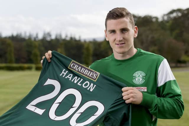 Hibs defender Paul Hanlon took a moment at training yesterday to celebrate completing 200 appearances. Picture: SNS