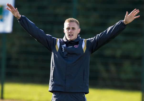 Kevin McHattie trains yesterday, eager to get to grips with the Palmerston Park pitch today. Picture: SNS