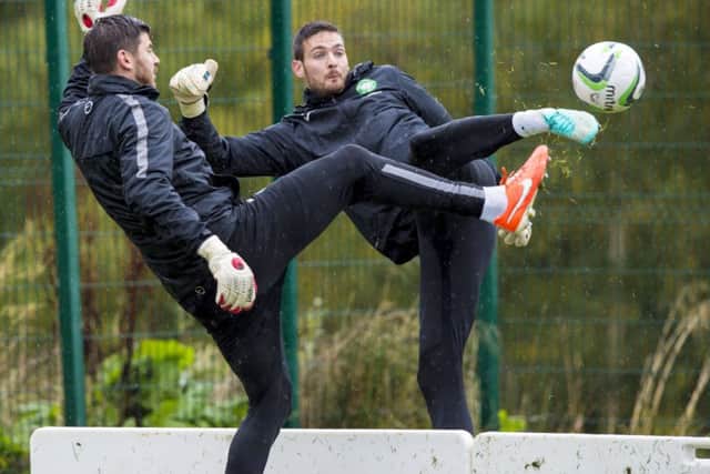 Celtic goalkeepers Craig Gordon, right, and Lukasz Zaluska prepare for tomorrows game against Hamilton. Picture: SNS