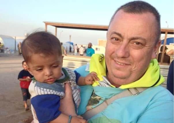 The video purpotedly shows British aid worker Alan Henning. Picture: PA