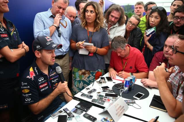 Sebastian Vettel speaks to the media following his decision to leave Red Bull at the end of the season. Picture: Mark Thompson/Getty