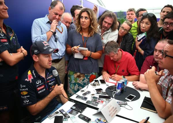 Sebastian Vettel speaks to the media following his decision to leave Red Bull at the end of the season. Picture: Mark Thompson/Getty