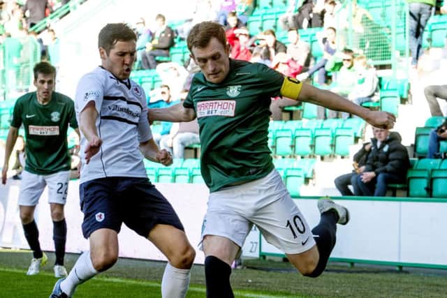 Hibernian's Liam Craig (right) is challenged from Liam Fox. Picture: SNS