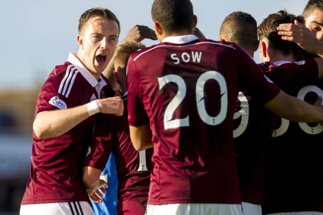 Hearts celebrate as the go 3-0 up. Picture: SNS