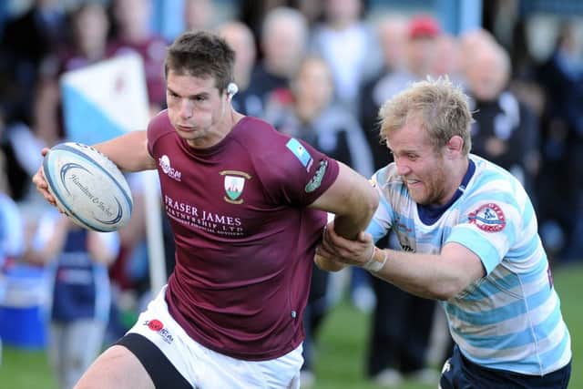 Galas American winger Brett Thompson tries to evade the clutches of Galas Michael Liness of Accies. Picture: Neil Hanna
