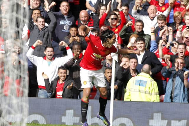 Falcao throws some shapes after nudging the ball over the line for Manchester United's second. Picture: Getty