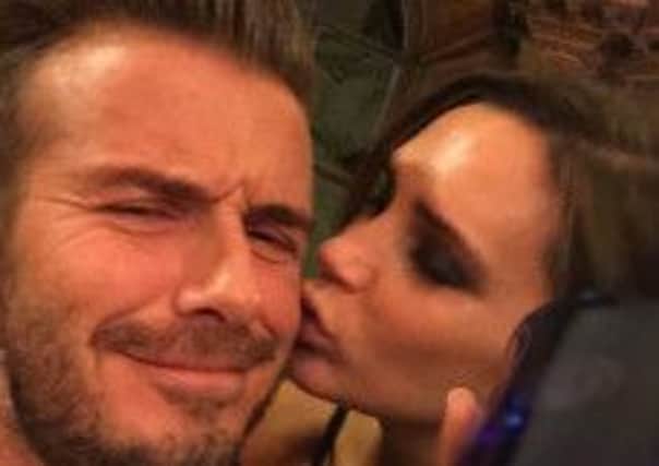 Sealed with a kiss: the Beckhams and friends were in Scotland to mark Davids soon-to-be-launched whisky. Picture: Contributed