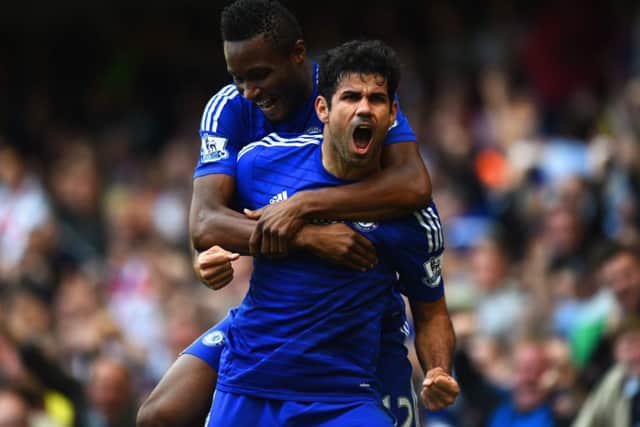 Diego Costa celebrates after scoring Chelsea's second against Arsenal. Picture: Getty