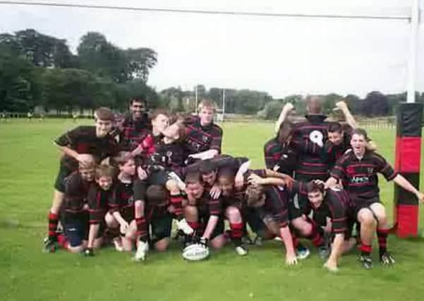 Abdul Rakib Amin, second left from back row, playing for Aberdeenshire Rugby Footlball club, 2006/2007. Picture: Hemedia