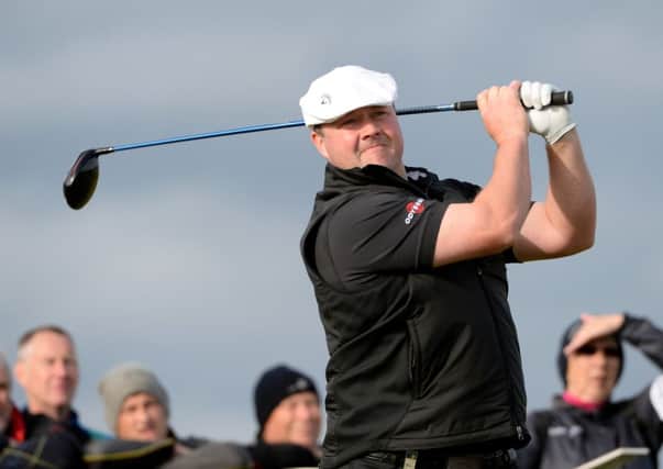 Chris Doak of Scotland plays off the 16th tee during the final round of the 2014 Alfred Dunhill Links Championship. Picture: Getty