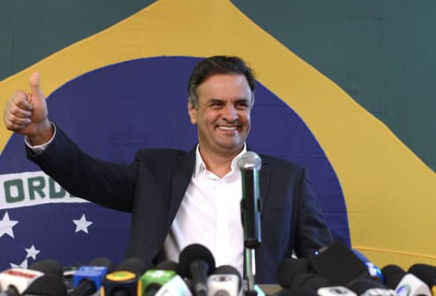 Challenger Aecio Neves made a late surge into the runoff. Picture: AP