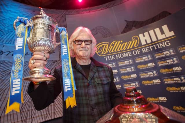 Billy Connolly helped make the draw at Edinburgh's Usher Hall. Picture: Steve Welsh