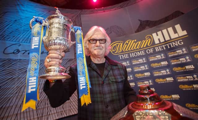 Billy Connolly helped make the draw at Edinburgh's Usher Hall. Picture: Steve Welsh