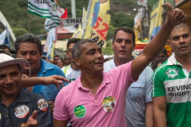 Romario takes part in a campaign rally at the Rocinha favela in Rio de Janeiro in August. Picture: Getty