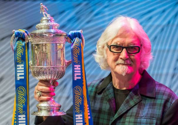 Billy Connolly with the Scottish Cup at Edinburgh's Usher Hall. Picture: Ian Georgeson