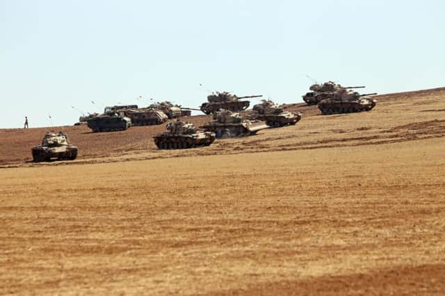 Turkish tanks mass near the Syrian border but invasion by IS is unlikely. Picture: Getty