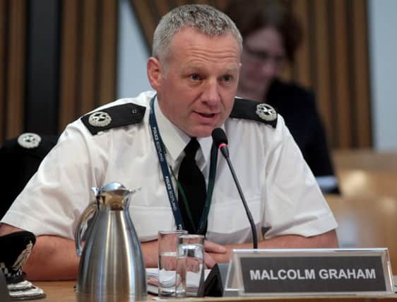 ACC Malcolm Graham is questioned by MSPs yesterday. Picture: Katielee Arrowsmith