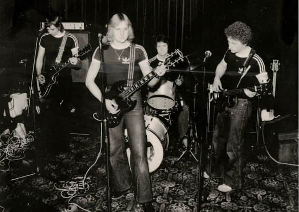 Kenny Hanlon, centre, in 1979 with Rough Edge, the band he was with before Glory Hunters. Picture: Hemedia