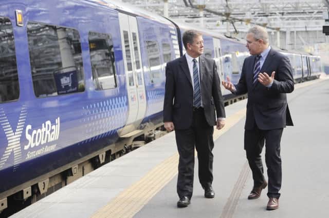 Transport Minister Keith Brown, left, and Jeff Hoogesteger, CEO of Abellio. Picture: Greg Macvean
