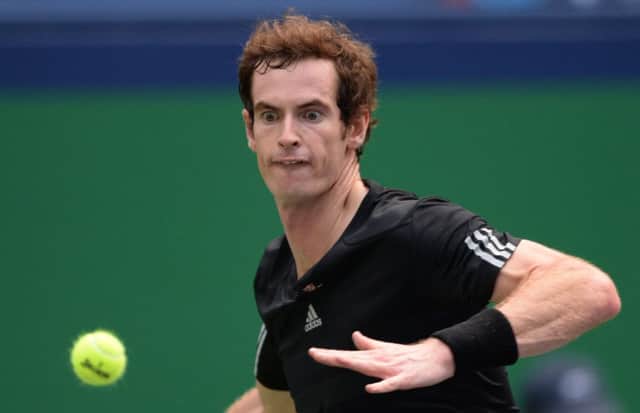 Andy Murray hits a return against David Ferrer. Picture: AFP