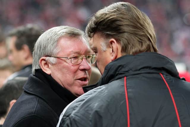 Sir Alex Ferguson has broken his silence over Louis van Gaal's (right) appointment. Picture: PA