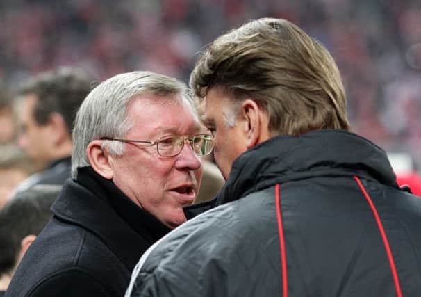 Sir Alex Ferguson has broken his silence over Louis van Gaal's (right) appointment. Picture: PA