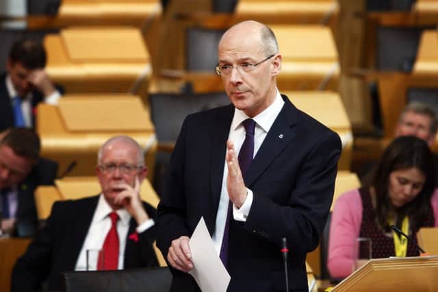 John Swinney lays out the Scottish Government Budget for 2015/2016. Picture: Andrew Cowan