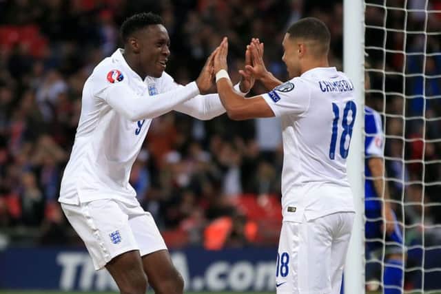 England's Danny Welbeck celebrates scoring his side's third goal of the game with teammate Alex Oxlade-Chamberlain. Picture: PA