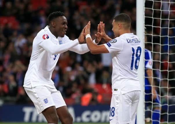 England's Danny Welbeck celebrates scoring his side's third goal of the game with teammate Alex Oxlade-Chamberlain. Picture: PA