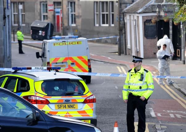 Police cordon off Eyre Place in Edinburgh as they investigate the rape of a woman in the area. Picture: Lisa Ferguson