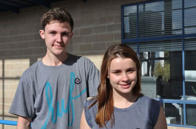 Debs Torr and Chris Dobson who are encouraging students to urinate in the shower to save water. Picture: PA