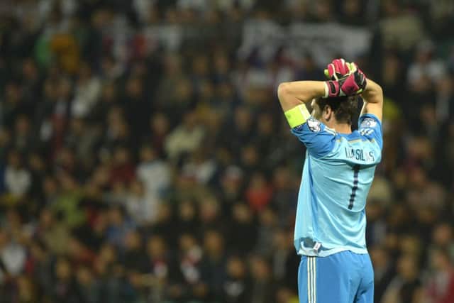 Spain goalkeeper Iker Casillas flapped at Juraj Kucka's 17th-minute free kick. Picture: Getty