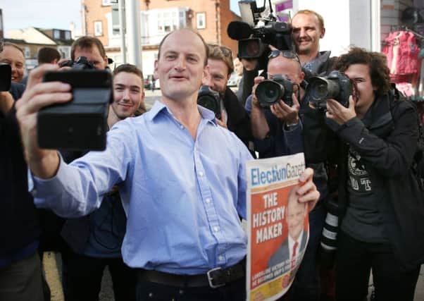 Douglas Carswell takes a selfie in ClactononSea after winning the by-election. Picture: Getty