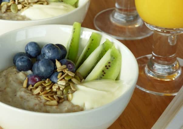 Sunflower and poppy seed porridge with kiwi, blueberries, seeds and yoghurt. Picture: Contributed