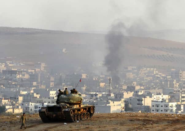 Turkish tanks in the outskirts of Suruc on the Turkey-Syria border. Picture: Getty