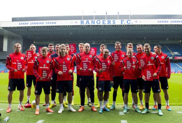 The Scotland squad promote an anti-racism campaign at Ibrox. Picture: SNS
