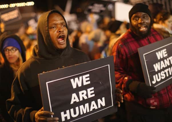 Activists gather for demonstrations and vigils following the shooting of a second black teenager by police last week. Picture: Getty