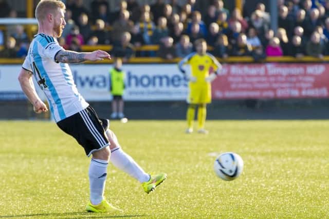 Adam Eckersley fires in the free kick he scored from at Alloa last Saturday. Picture: SNS