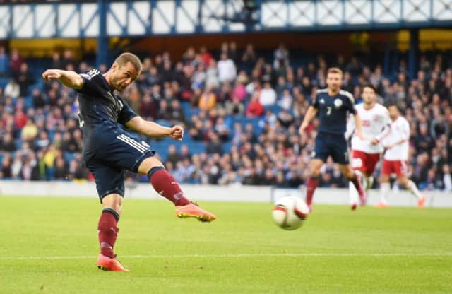 Shaun Maloney fires Scotland into the lead. Picture: SNS